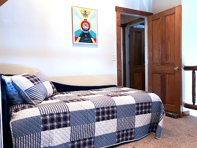 Single daybed in the open loft